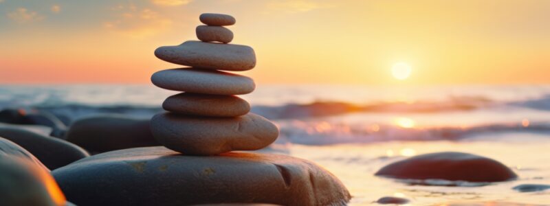 A stack of rocks sitting on top of a beautiful beach. Perfect for nature and relaxation concepts.